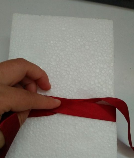 怎样绑生日蛋糕的盒绳?说详细一点,或者发几个图片