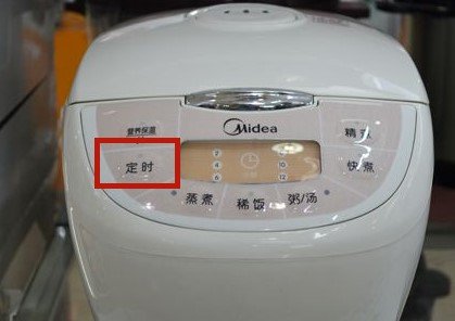 美的电饭煲怎么热饭?