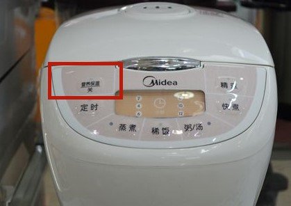 美的电饭煲怎么热饭?